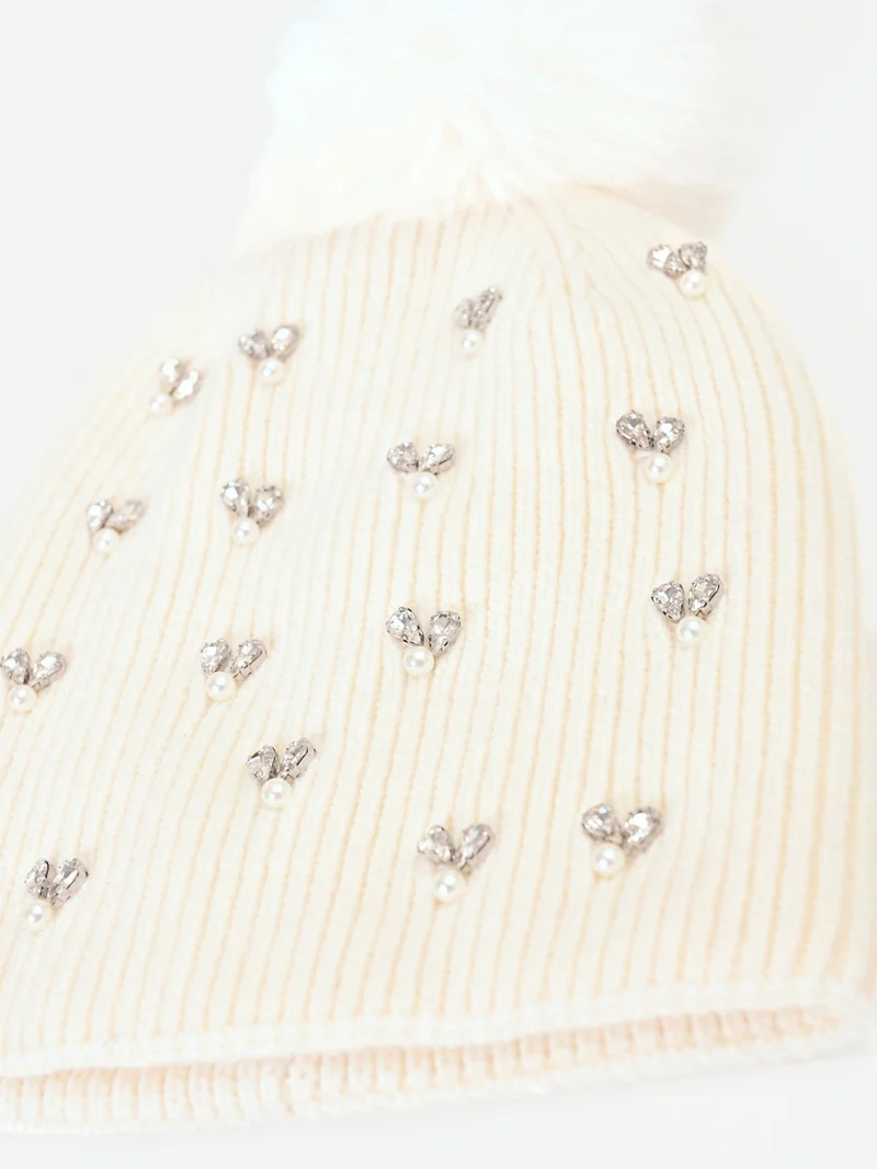 Cappellino bianco con cristalli e pompon