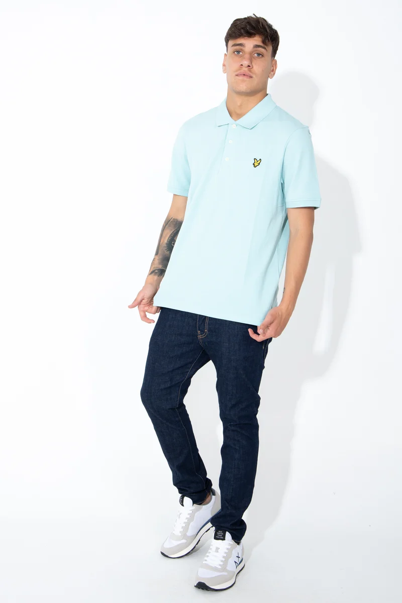 Polo con logo giallo