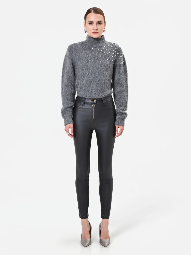 Leggings neri in similpelle con zip frontale